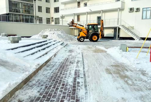 Стоимость уборки снега с прилегающей территории к магазину в Киеве | SnegaNet